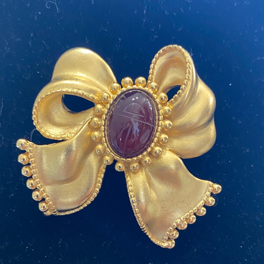 Vintage Gold Bow Brooch with Garnet-Colored Cabochon Center